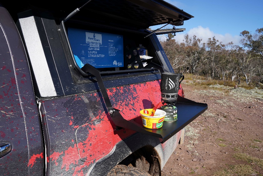 Bossco canopy storage box with meal during an off-road trip